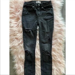Distressed skinny jeans